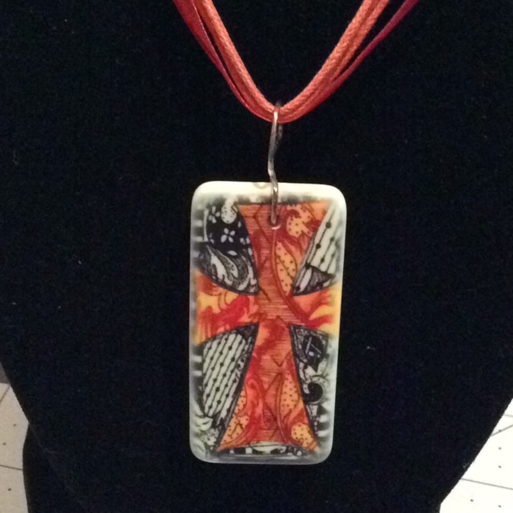 Hand crafted cross necklace.